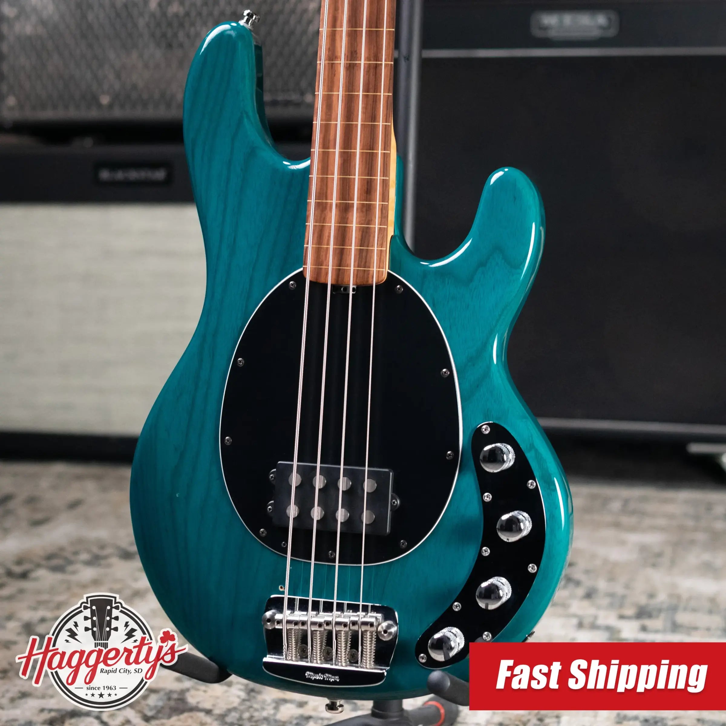 Ernie Ball Music Man StingRay 4 H Fretless Bass Translucent Teal - Used
