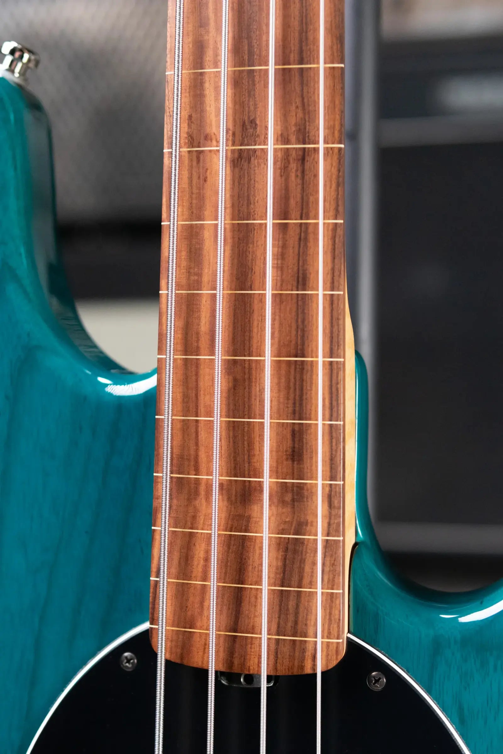 Ernie Ball Music Man StingRay 4 H Fretless Bass Translucent Teal - Used