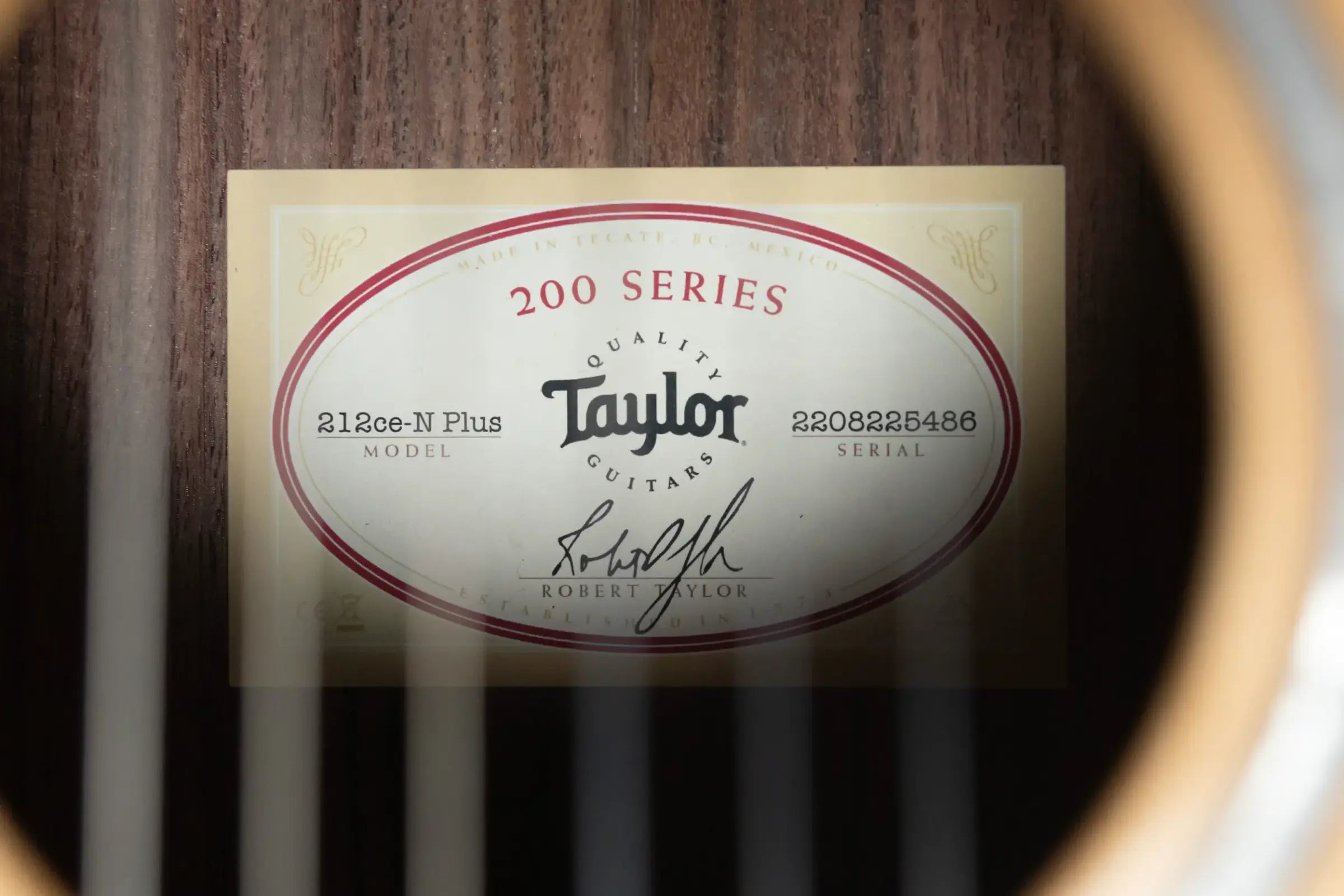 Taylor 212ce-N Plus Grand Concert Acoustic/Electric Guitar with Aerocase