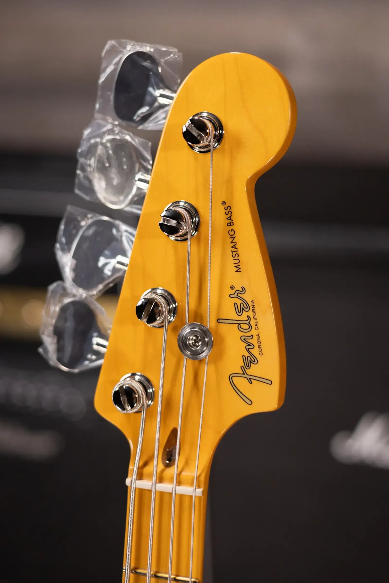 Fender American Professional Classic Mustang Bass - Faded Dakota Red with Gig Bag