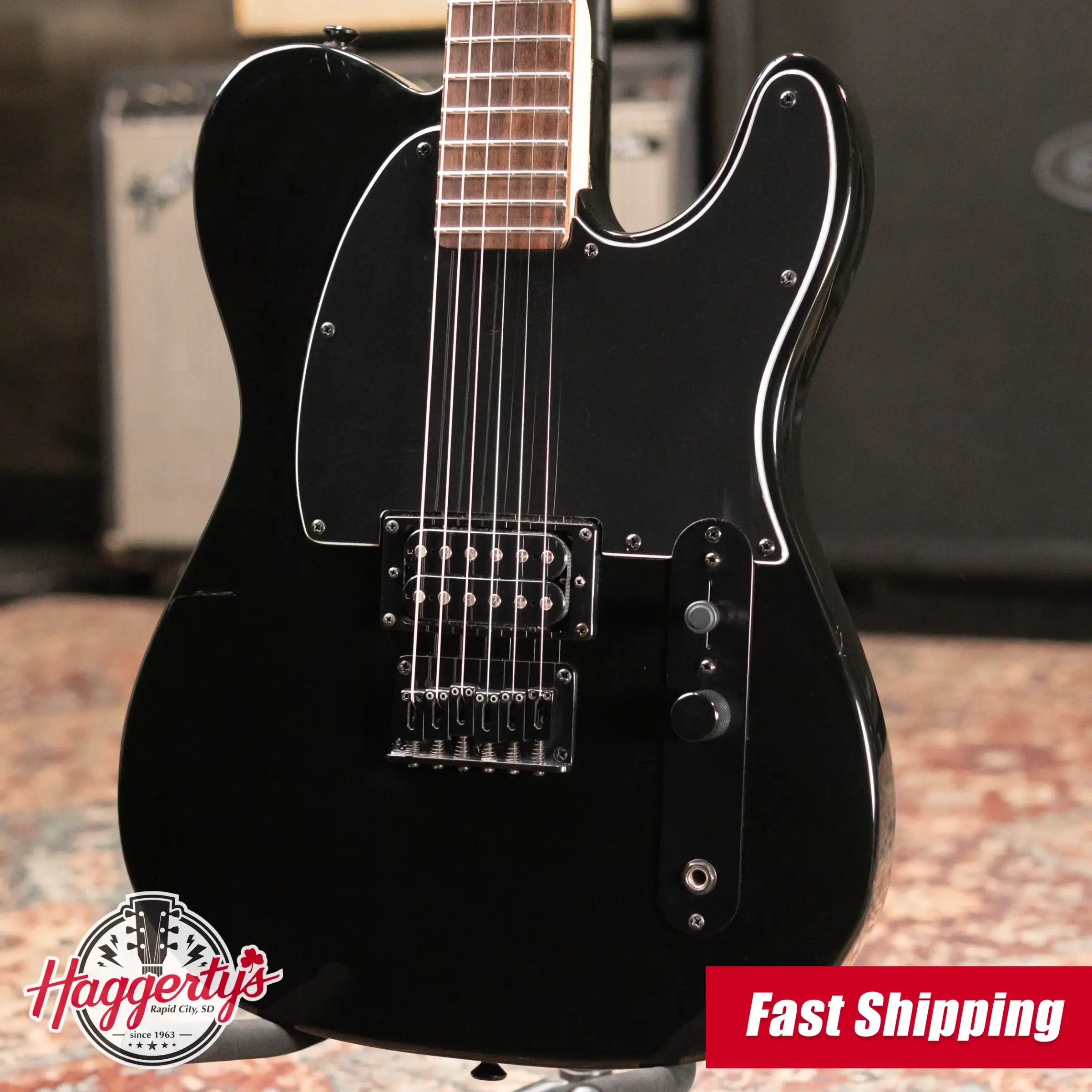 Squier Avril Lavigne Telecaster Electric Guitar - Black with Skull and Crossbones Logo - Used