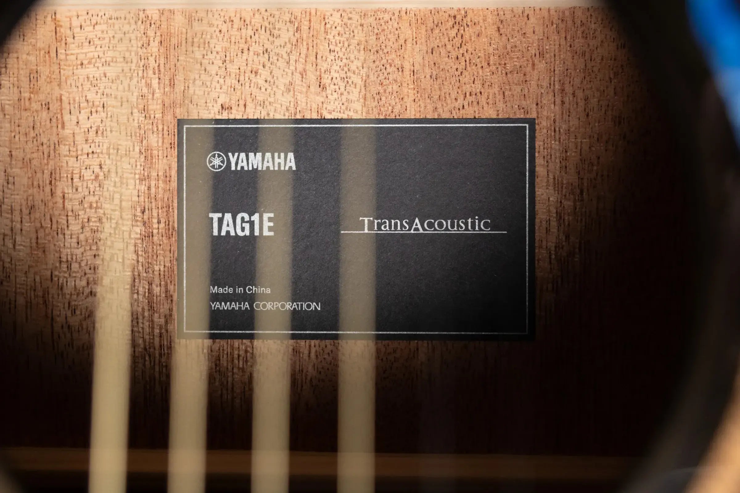 Yamaha TAG1E TransAcoustic Acoustic/Electric Guitar - Translucent Black with Gig Bag